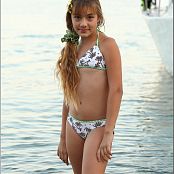 Download TeenModelingTV Khloe Palm Tree Bikini Part 1 & 2 Picture Set