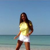 Download Christina Model Yellow TShirt On The Beach AI Enhanced Video