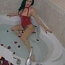 VancouverDomina OnlyFans 2020 12 18   Feeling festive bathing in red latex and red rose petals