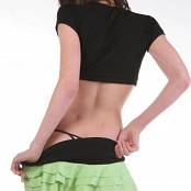 Sadie Jones green ruffly miniskirt w black top 6